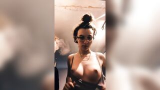 Flashing her tits on live stream