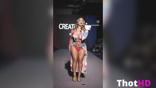 New York Fashion Week Show moments after the intruder ar the Creators Inc x Bossi Show. Brunette persian teen @IG : AraQueenBae walking cat walk NYFW at the Conrad Hotel Hilton Group in Tribeca wearing a rhinestone bikini paired with tiedye funky cover up