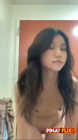 Barely legal Thai girl fingering tiny pussy
