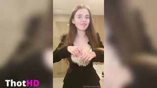 megnut non nude business outfit cleavage