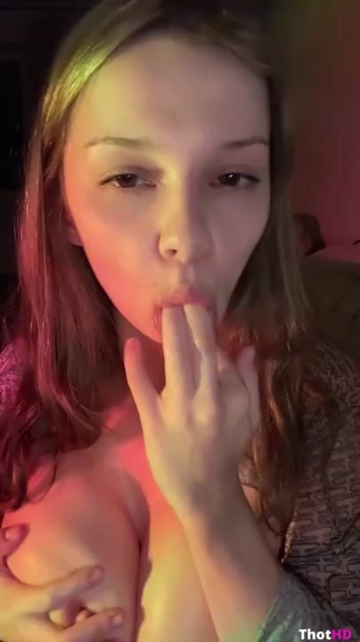 peach_jodie Jodie Peach licking her fingers while squeezing her huge tits