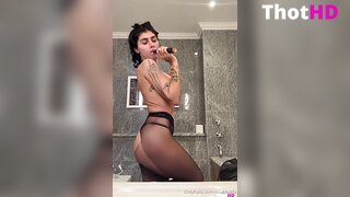Mia Khalifa topless Big Tits pantyhose bathroom NSFW Video