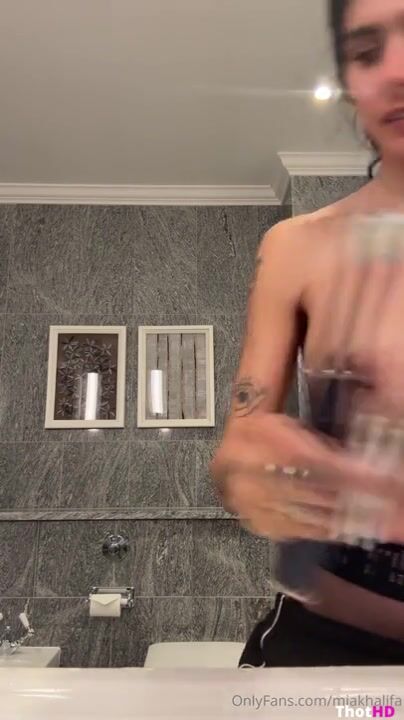 Mia Khalifa topless Big Tits pantyhose bathroom NSFW Video