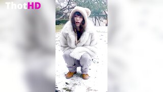 Emiru squatting outdoor