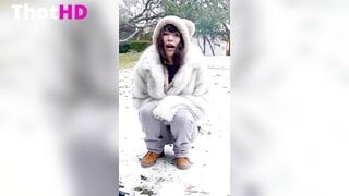 Emiru squatting outdoor