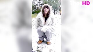 Emiru squatting outdoor