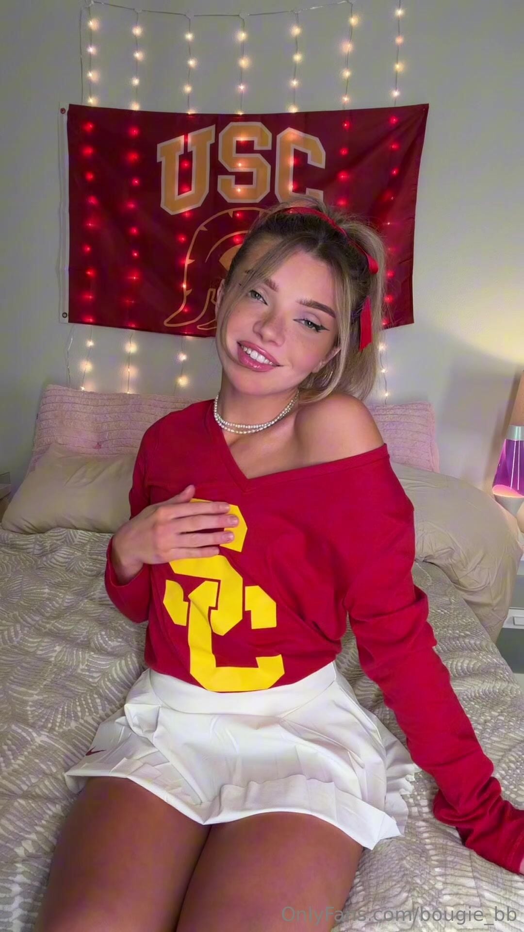 Bougie_bb Wearing a Miniskirt on a Bed OnlyFans